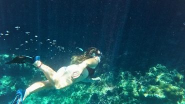 Snorkeling in clear waters during a Leave No Trace outdoor activity in Ibiza with EasyAdventurs