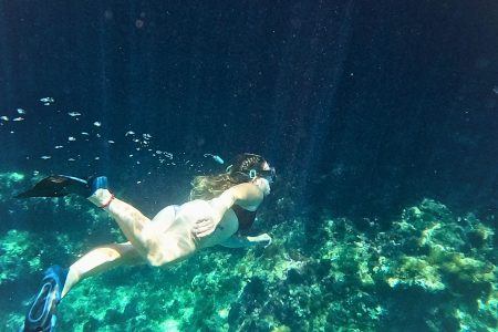 Snorkeling in clear waters during a Leave No Trace outdoor activity in Ibiza with EasyAdventurs